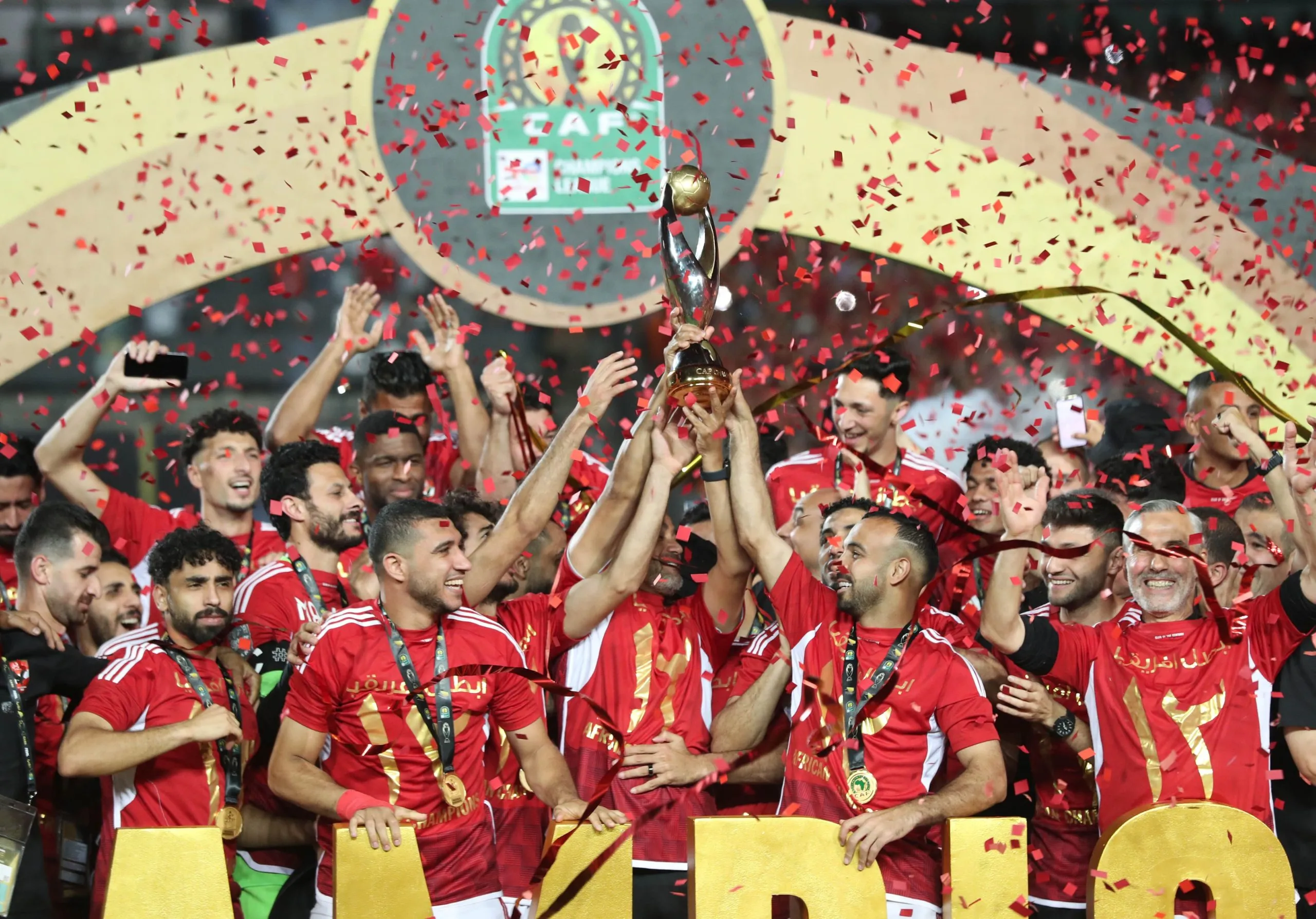 An early own goal from Roger Aholou don secure 1-0 victory for Al Ahly of Egypt against Tunisian side Esperance, give dem record-extending 12th CAF Champions League title.